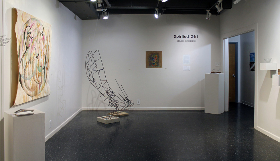installation view of gallery: sculplture and paintings