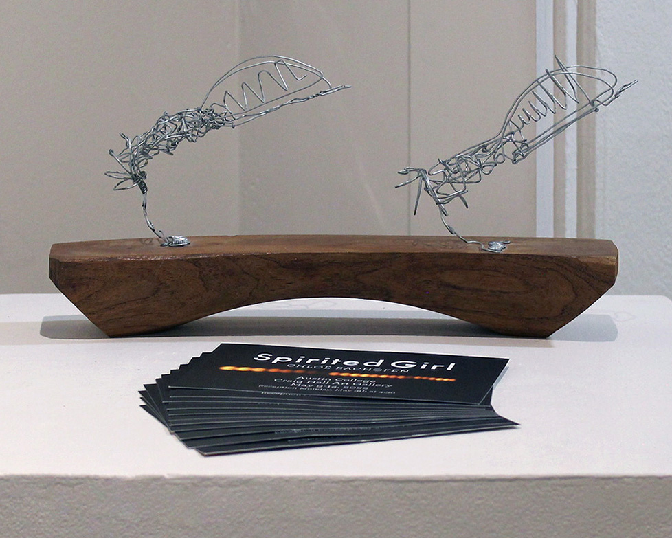 maquette of wire legs and invitations