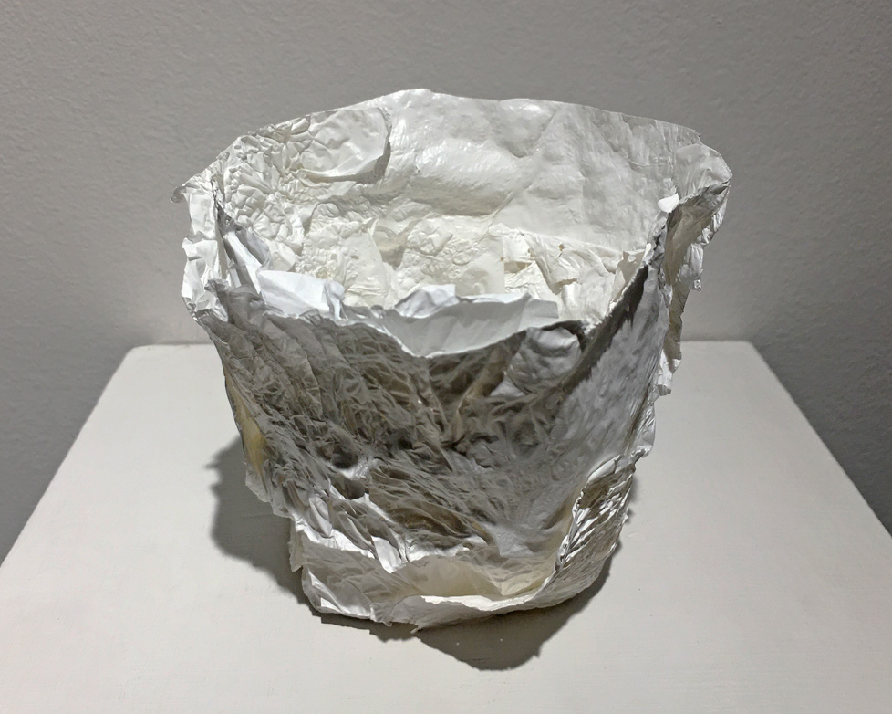 cup of crumpled paper