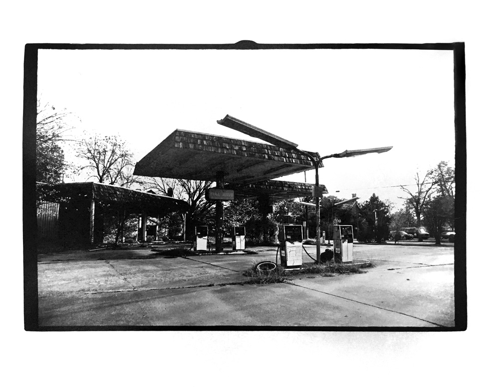 B&W photo: gas station