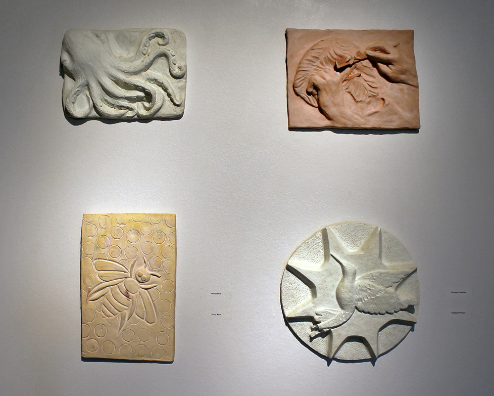 cast plaster relief sculptures