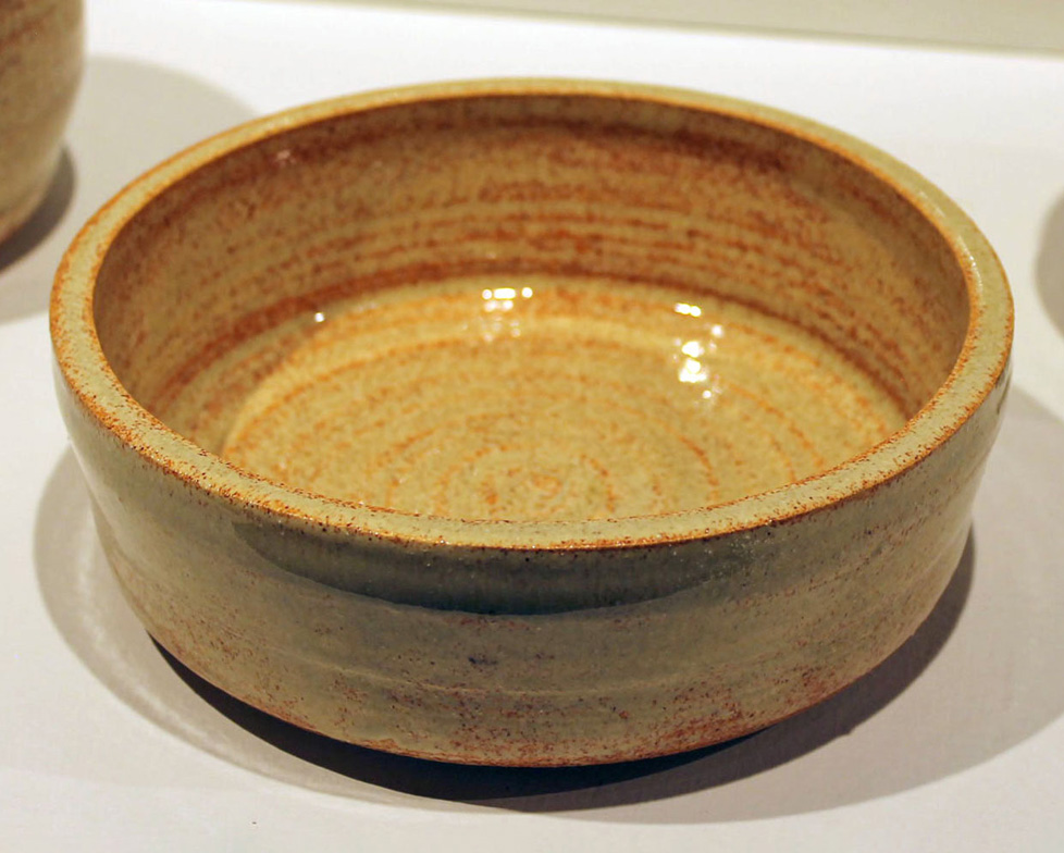 tan ceramic bowl, warm undertones