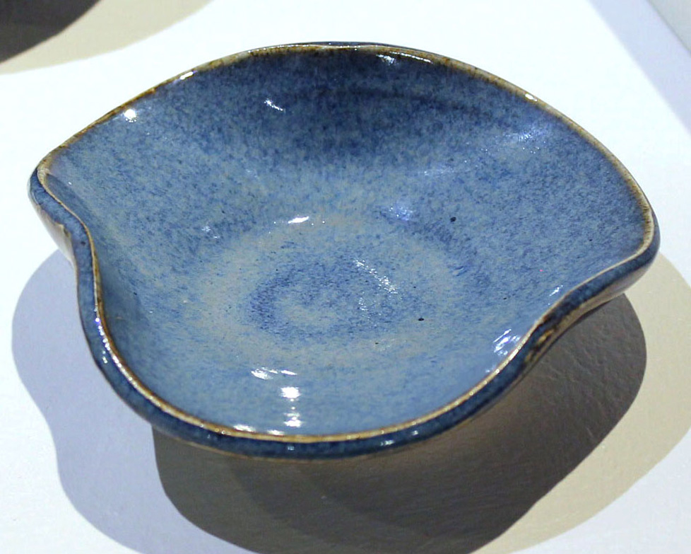 lighter blue ceramic spoon rest, wavy edges
