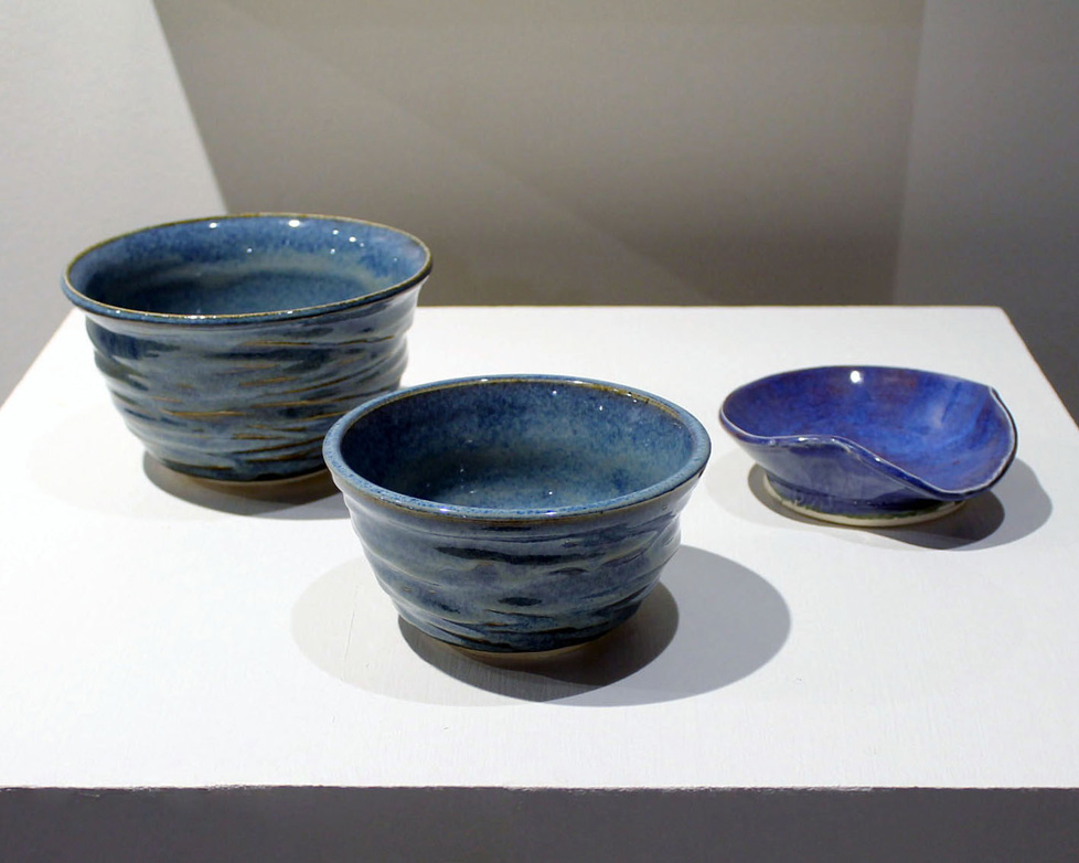 three blue bowls