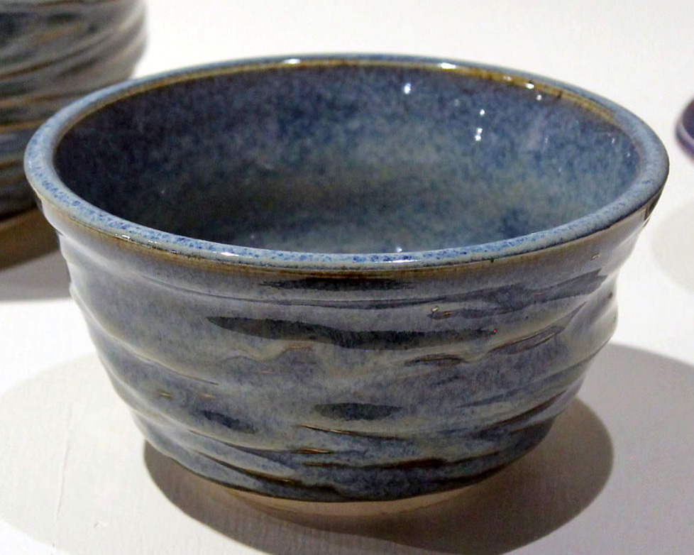 blue ceramic bowl, wavy texture, slightly smaller