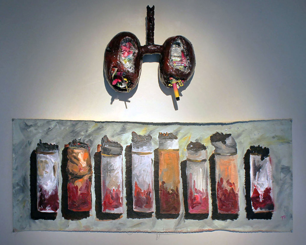 sculpture of lungs filled with smoking paraphernalia about a painting of cigarette butts