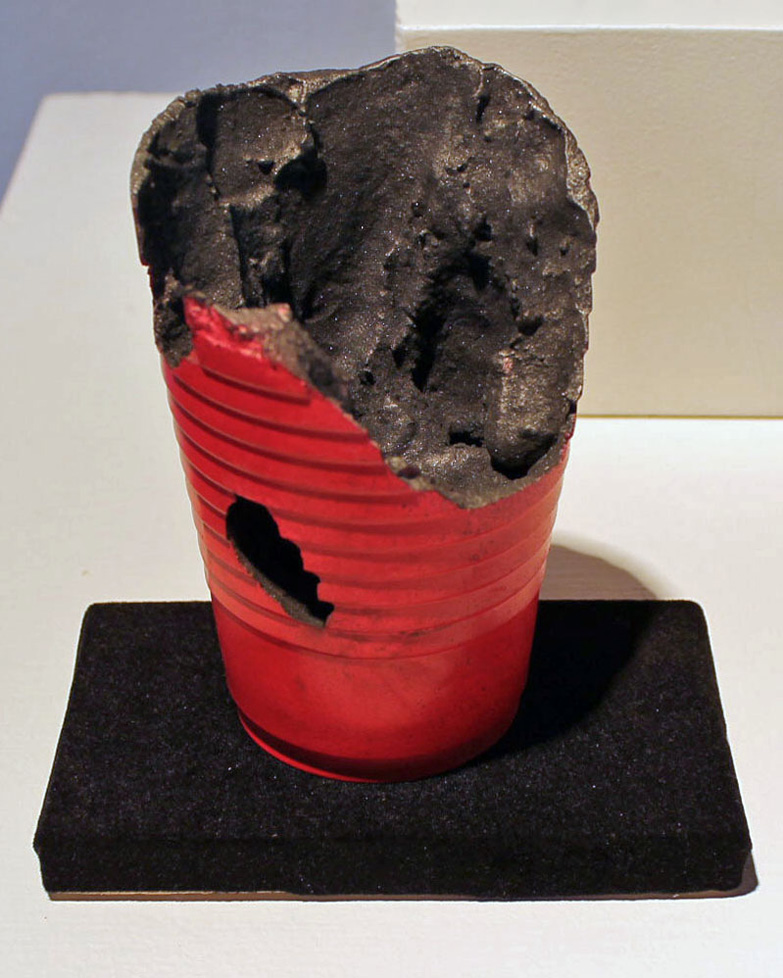deteriorating cast of a cup