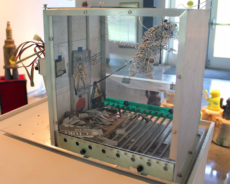back view of experiment box with prison-style accessories