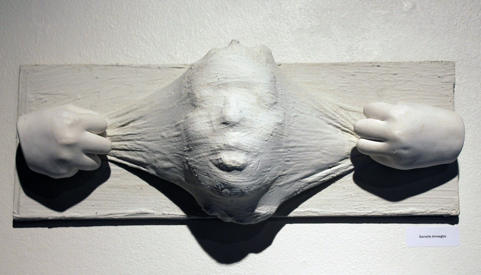 cast plaster face and hands