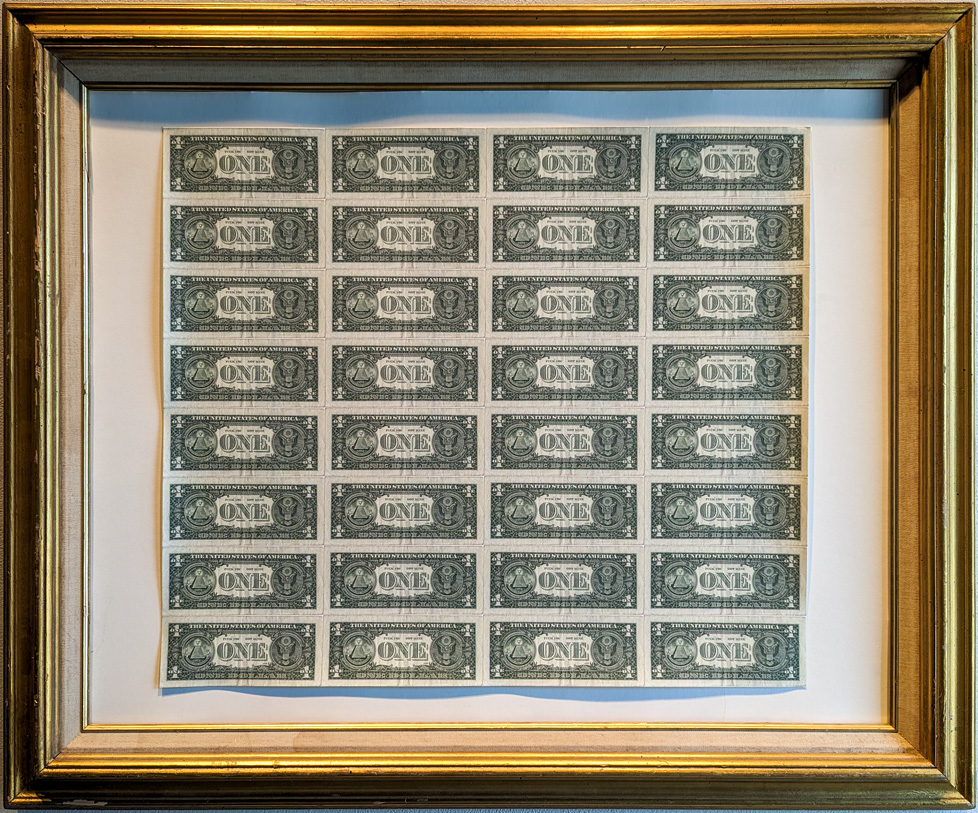 sheet of 24, 1 dollar bills in gold frame
