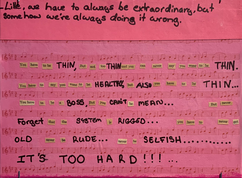 text collage on pink sheet music