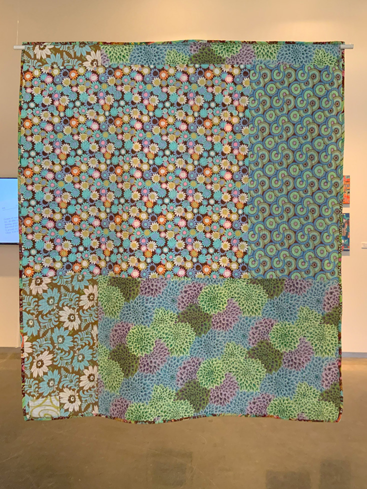 quilt back - foral print fabric in greens and blues