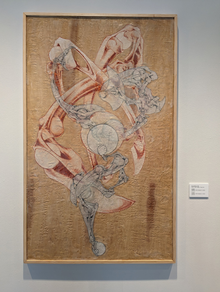 painting of bones on regtangular wooden panel