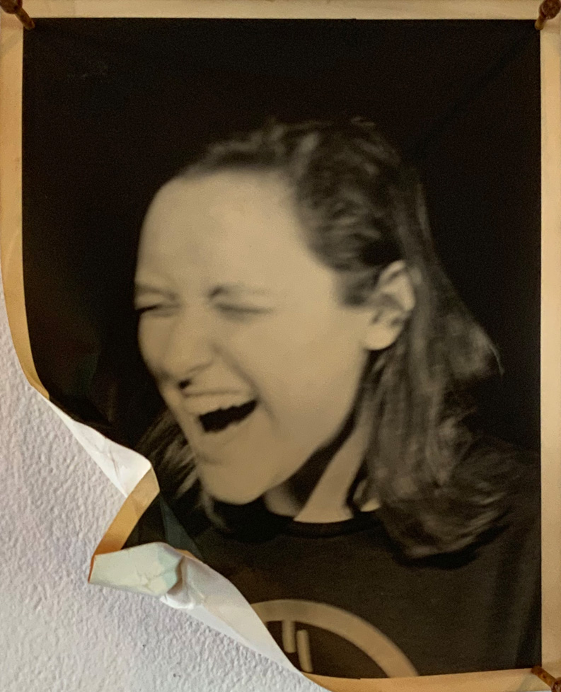 photo of woman screaming with folded corner