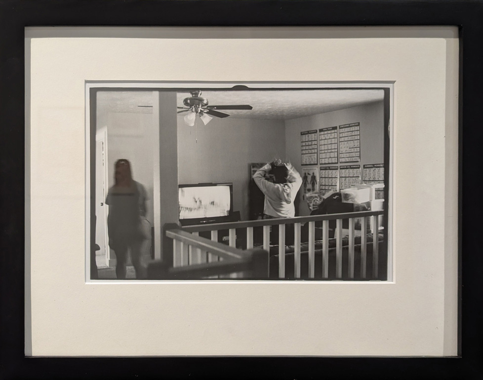 framed and mated b/w photograph