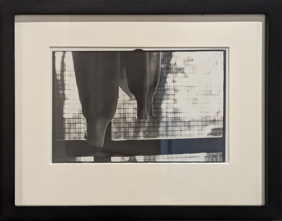framed and mated b/w photograph