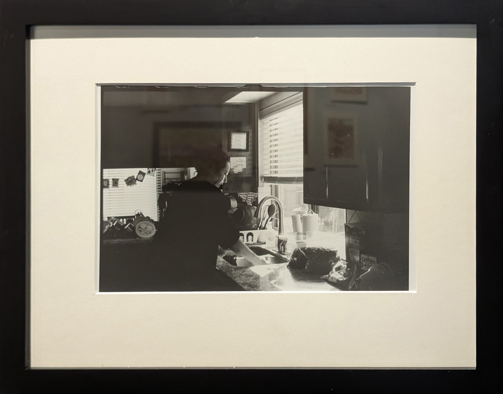 framed and mated b/w photograph