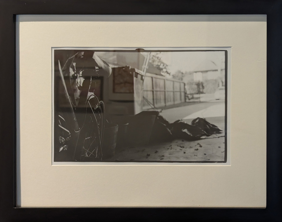 framed and mated b/w photograph