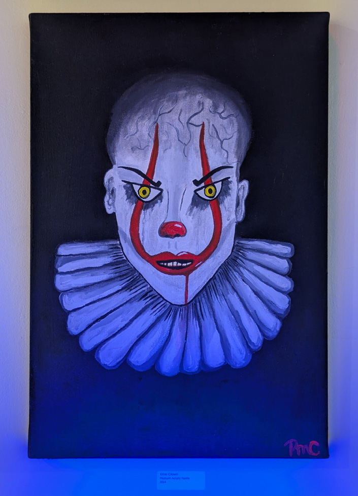 painting lit from below with blacklight