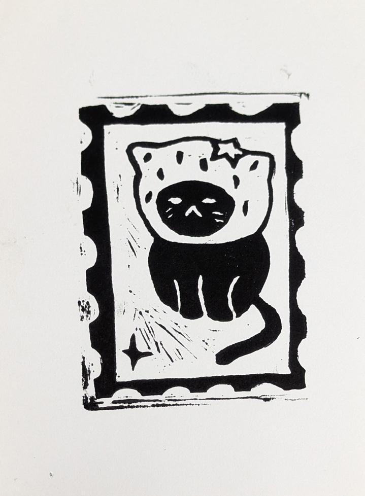 print of cat with Hello Kitty mask on stamp