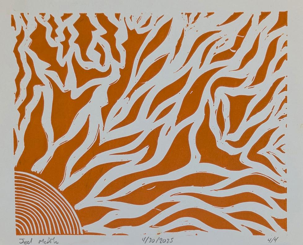 orange sunburst, radiating from bottom left corner