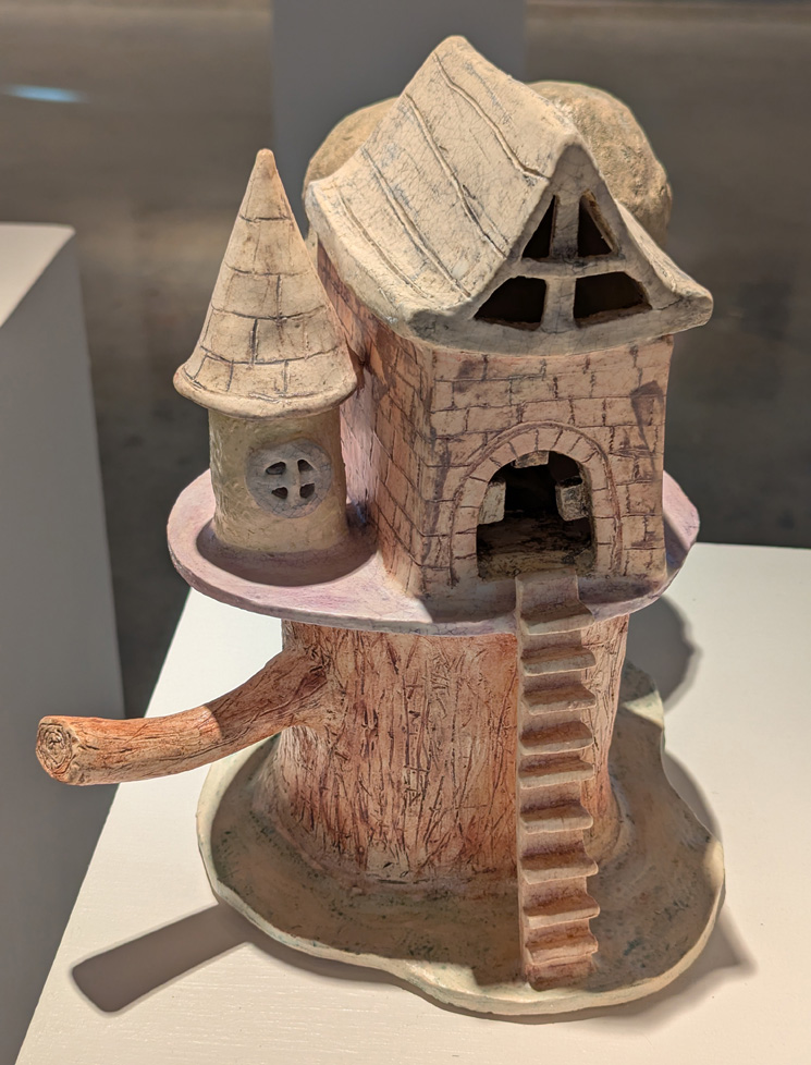 ceramic sculpture of treehouse