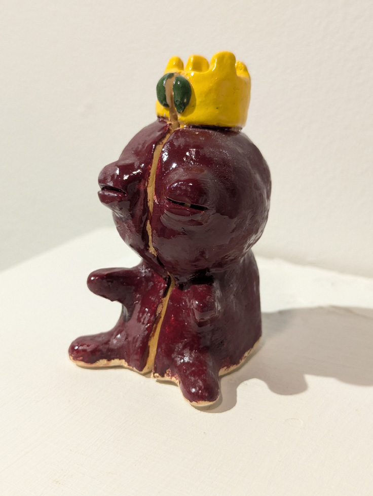 ceramic figure with crown