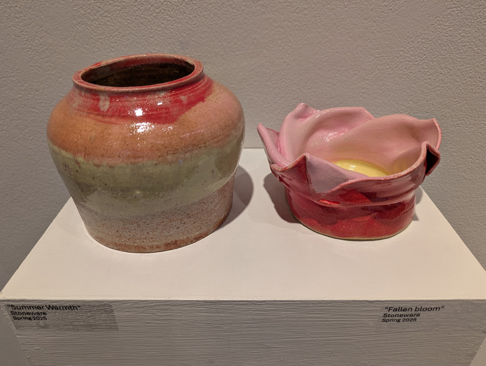 2 ceramics on wall pedestal