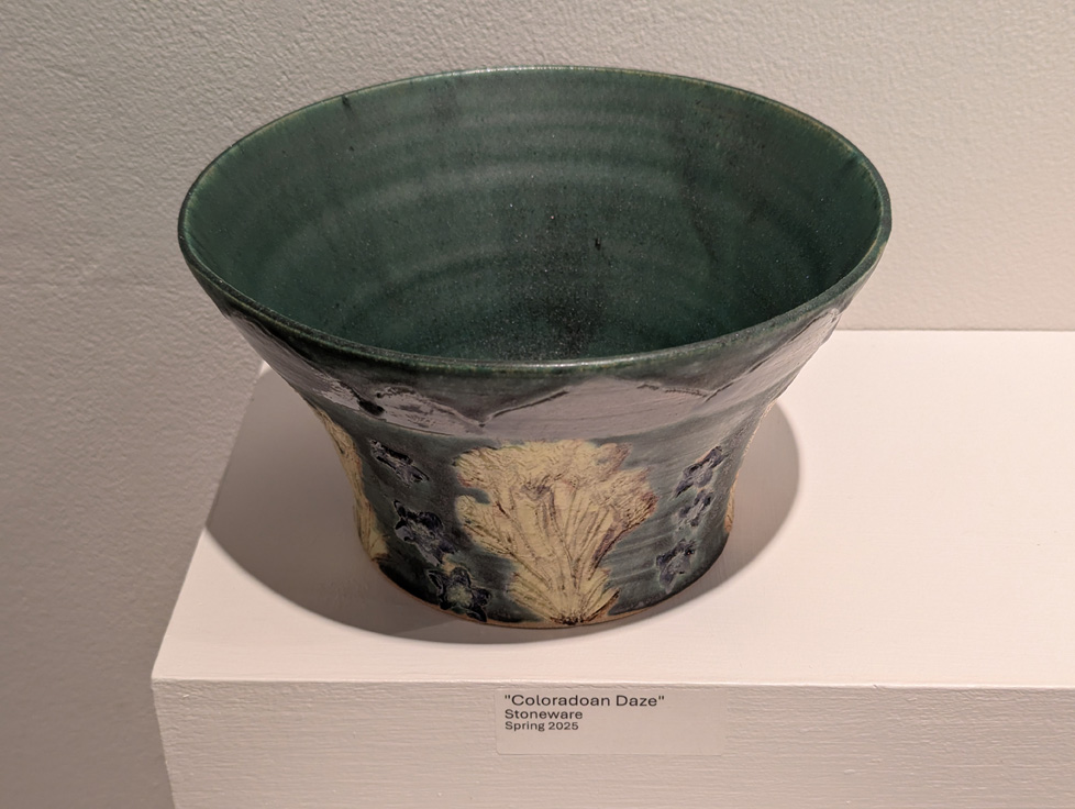 large bowl with mountains and flowers carved/painted
