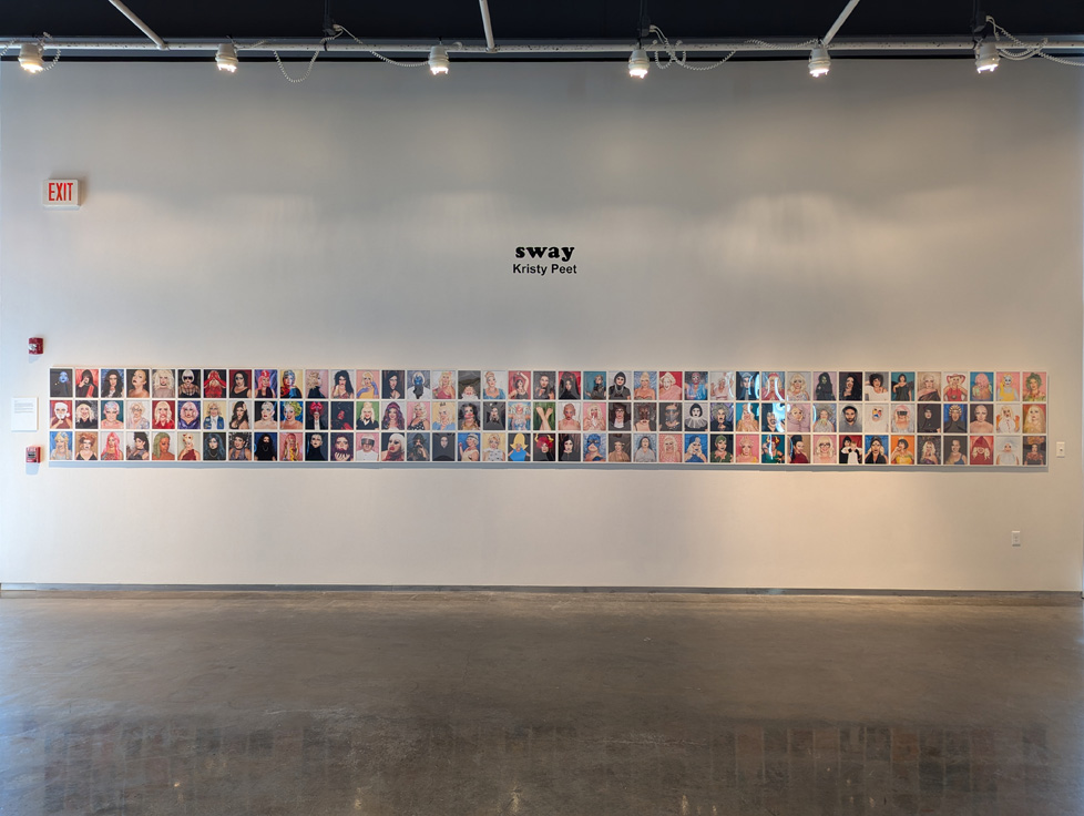 tight grid of portrait photos on gallery wall