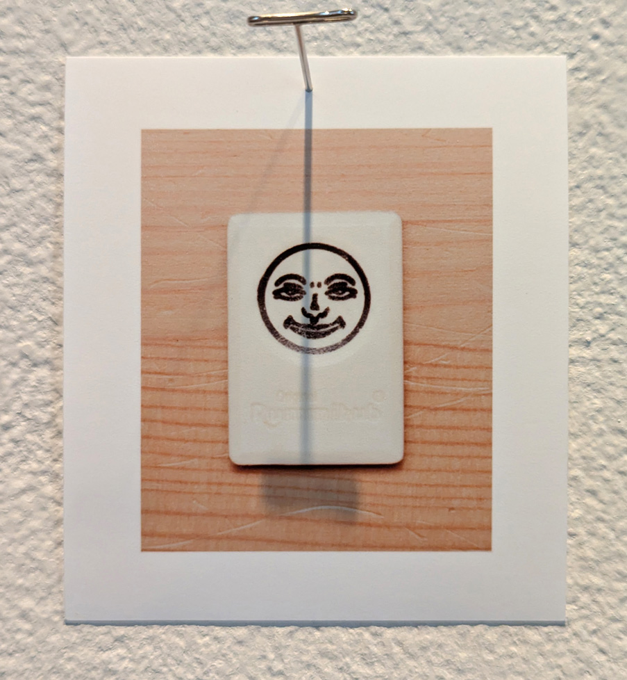 Rummikub tile on wood