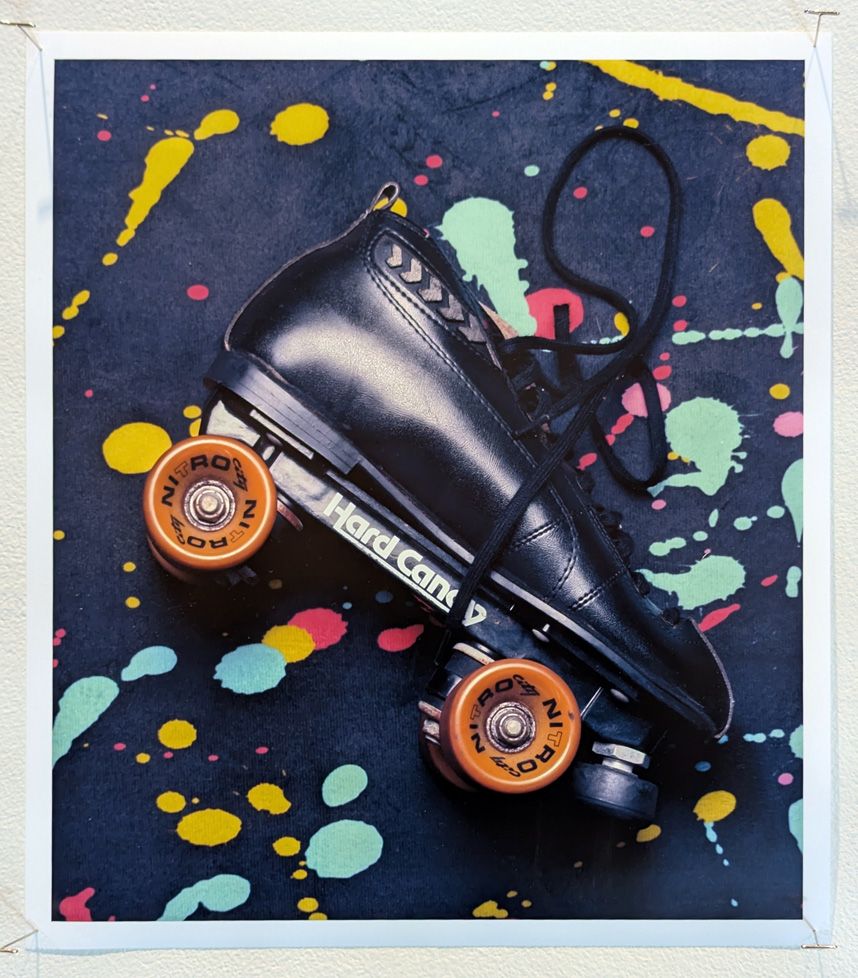 roller skate on colorful splatterpaint background