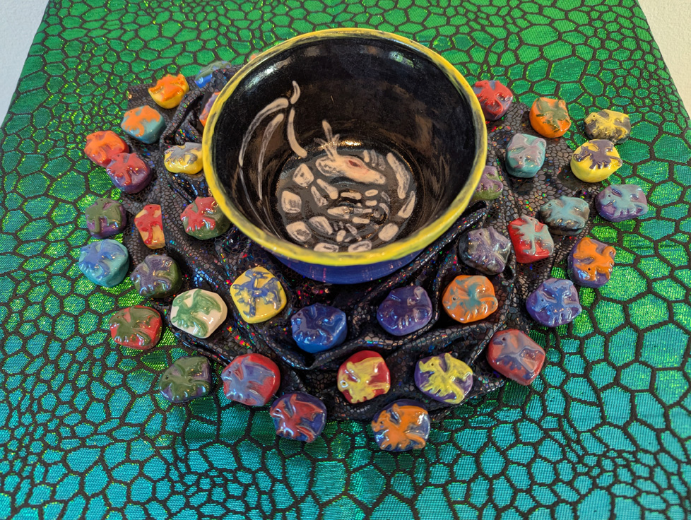uncovered bowl with dragon skeleton painted inside
