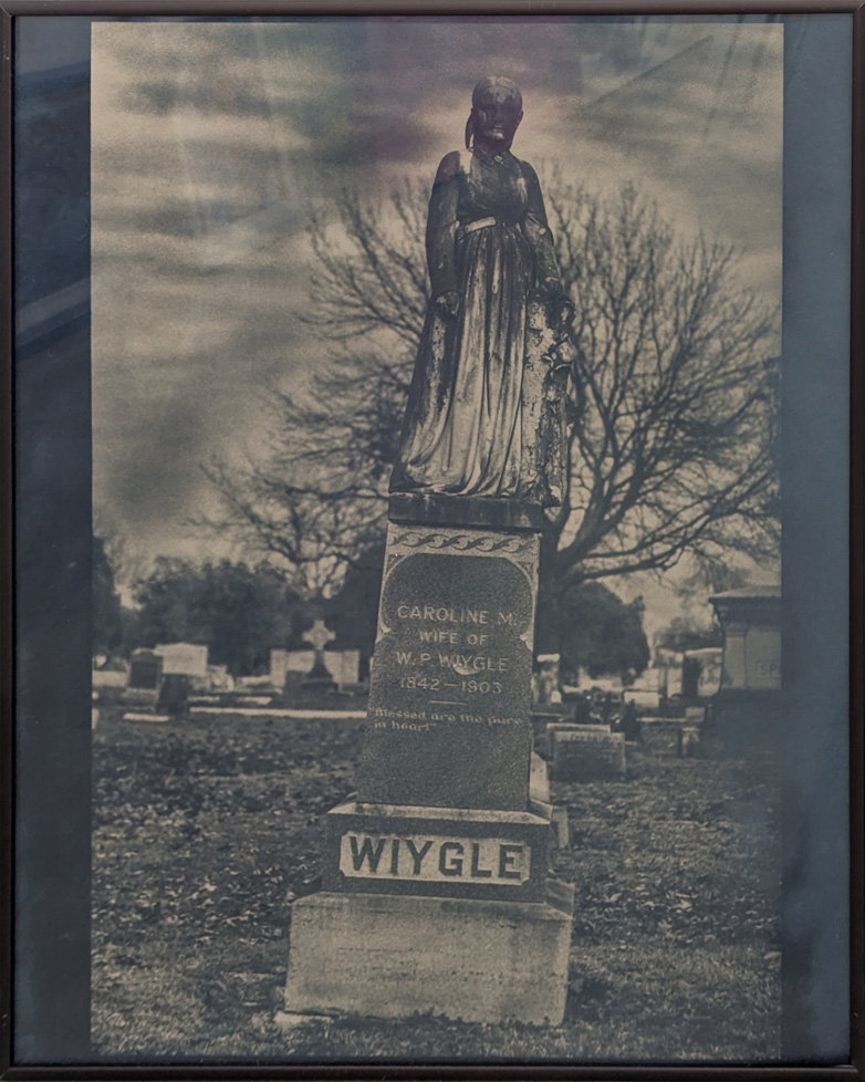tinted photo of gravestone: Caroline M. Wiygle, wife of WP Wiygle, 1842-1903