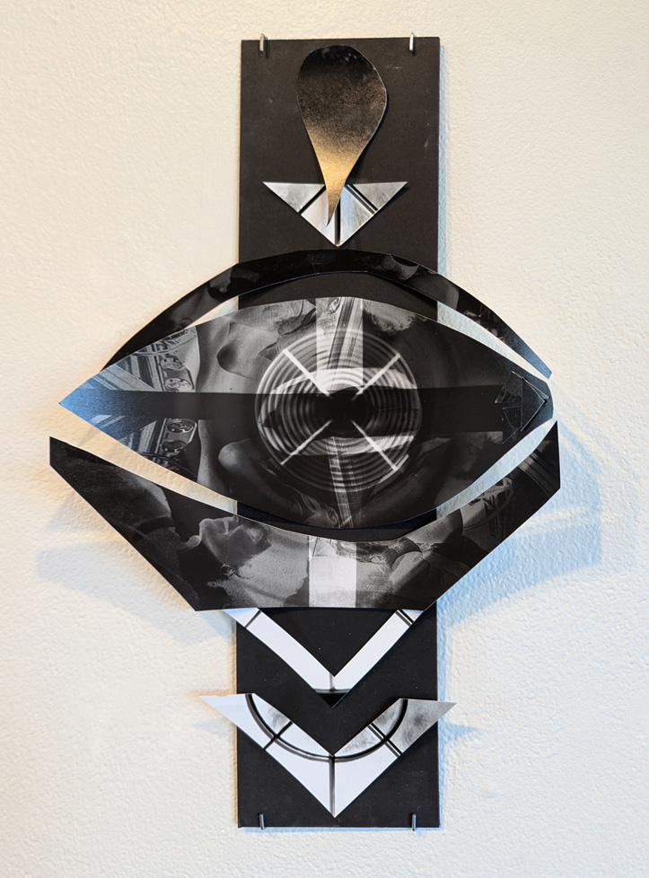 b/w collage of photos in shape of eye on black matboard