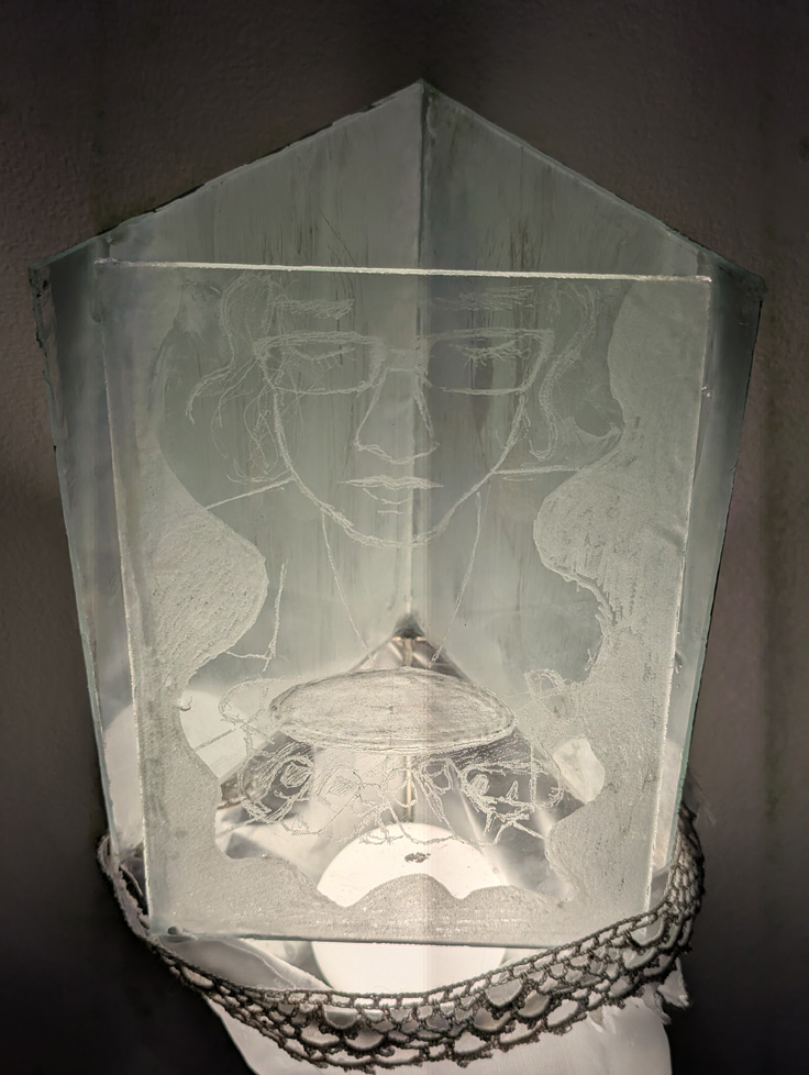 detail of engraved glass lampshade