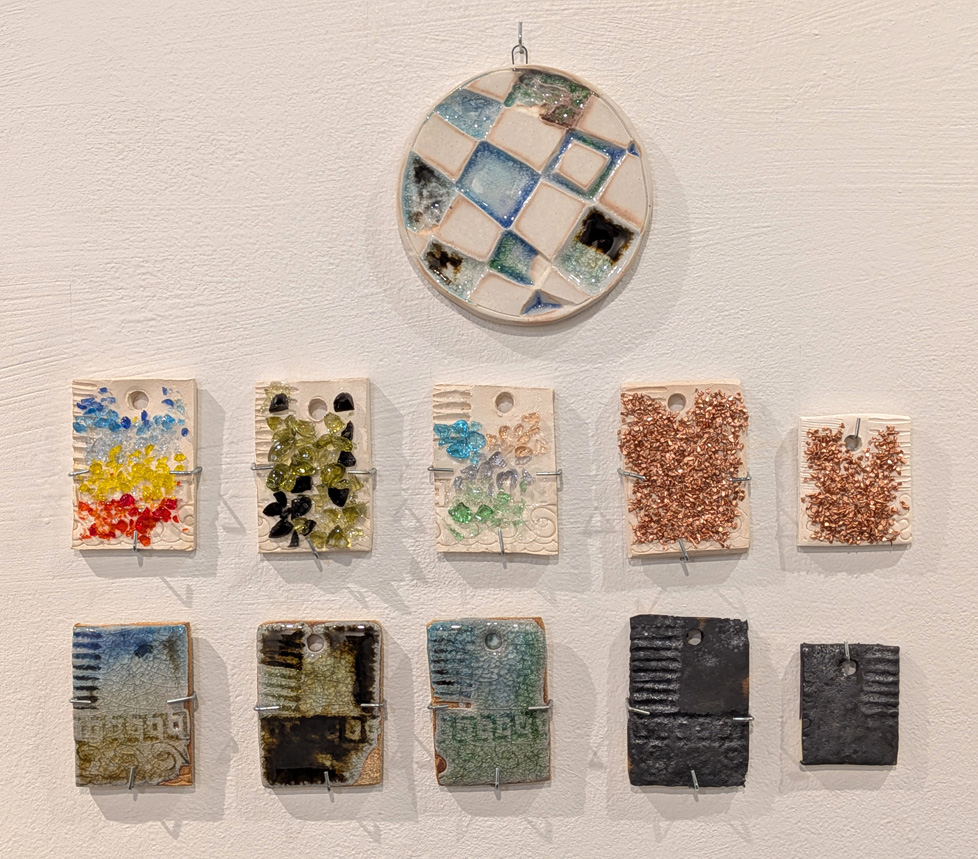 ceramic disc and 10 tiles on wall