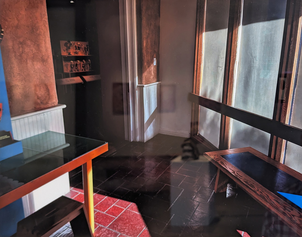 photo of interior space with red tile floor