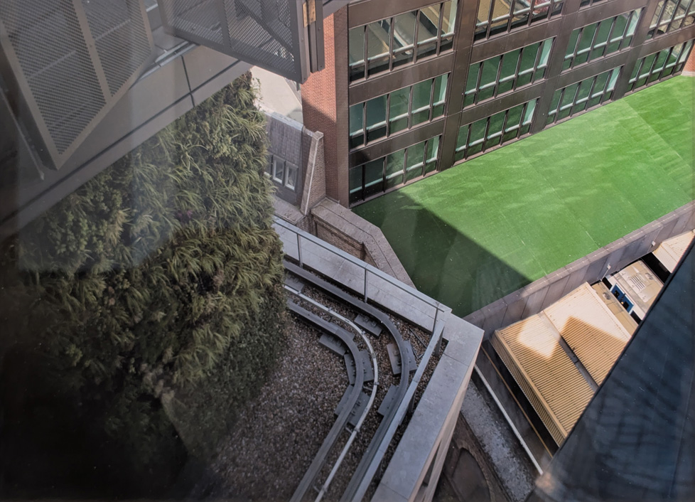 photo of view down from high rise into courtyard