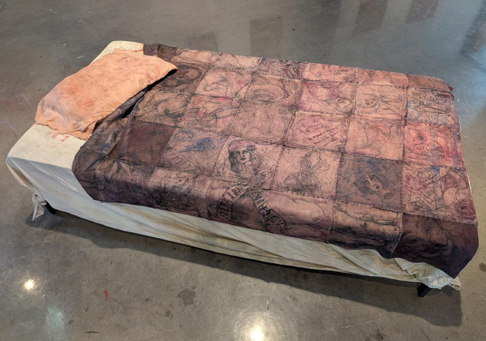 bed cover and pillow made of fake skin with tatoos