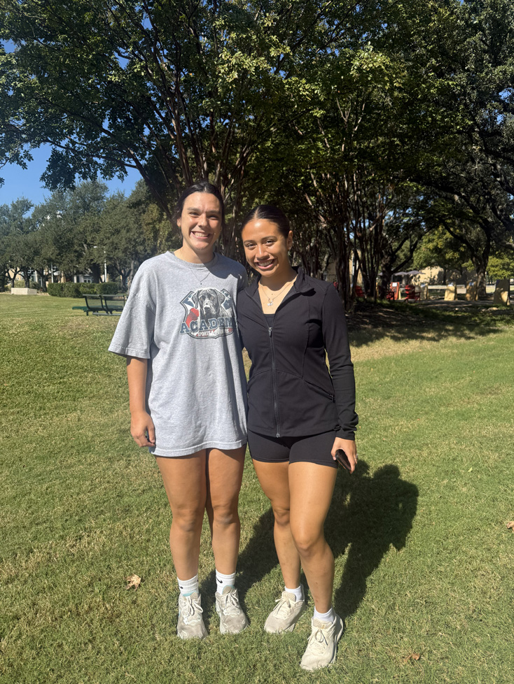 Layla & Myles standing on the green