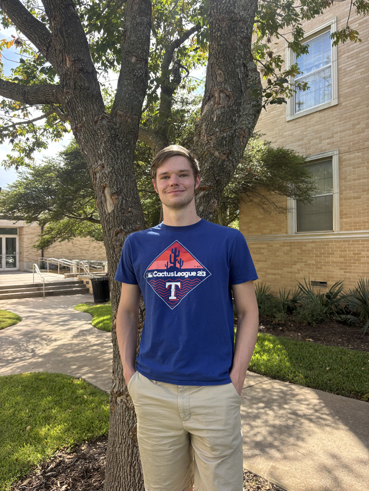 David in blue shirt, hands in pockets, outside WCC