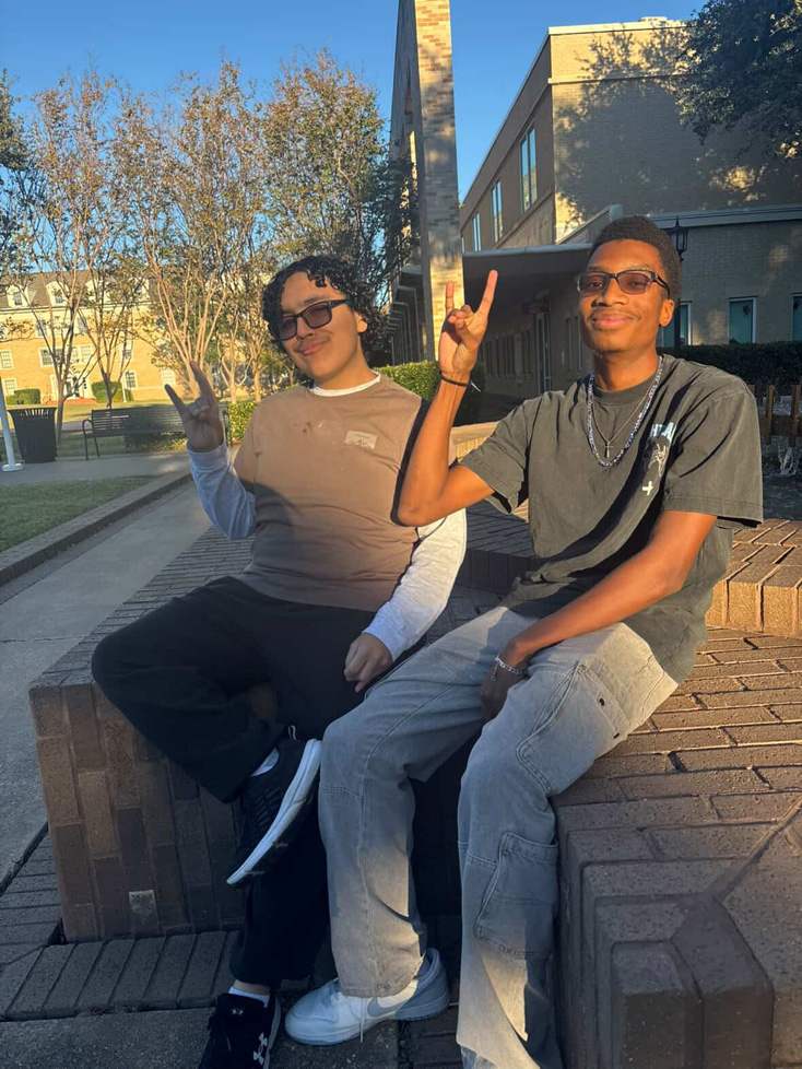 Marcelo & Joe sitting on fountain