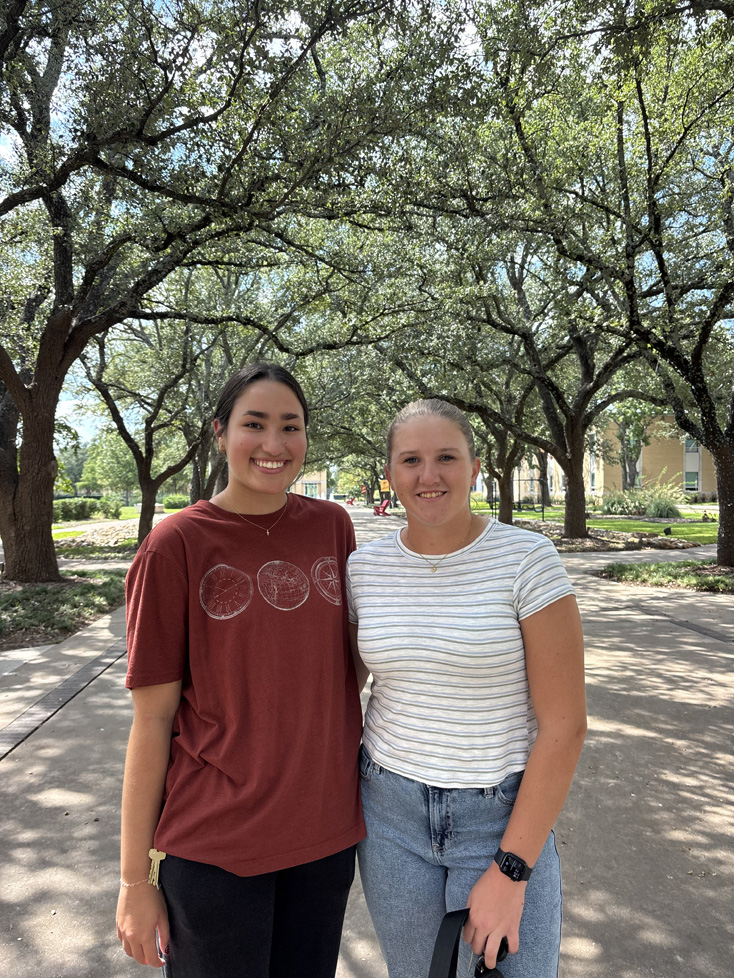 Karla & Lauren arm in arm on the mall