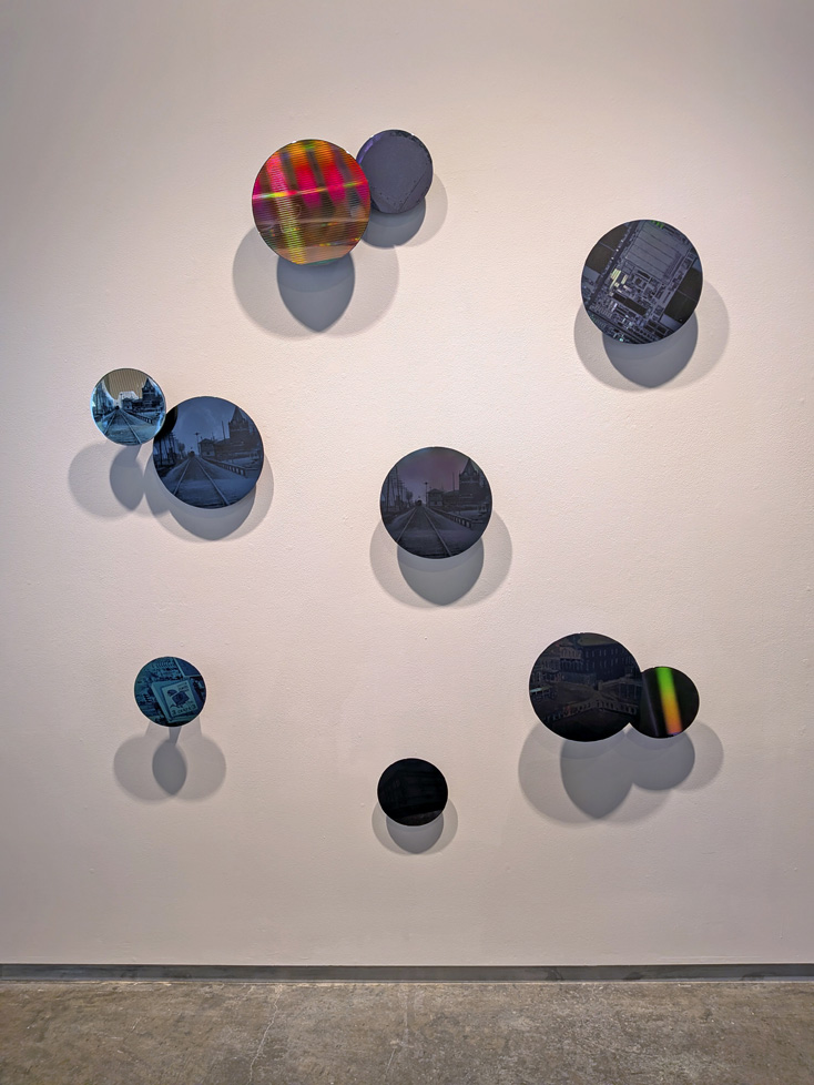 wall installation of decorated wafer discs