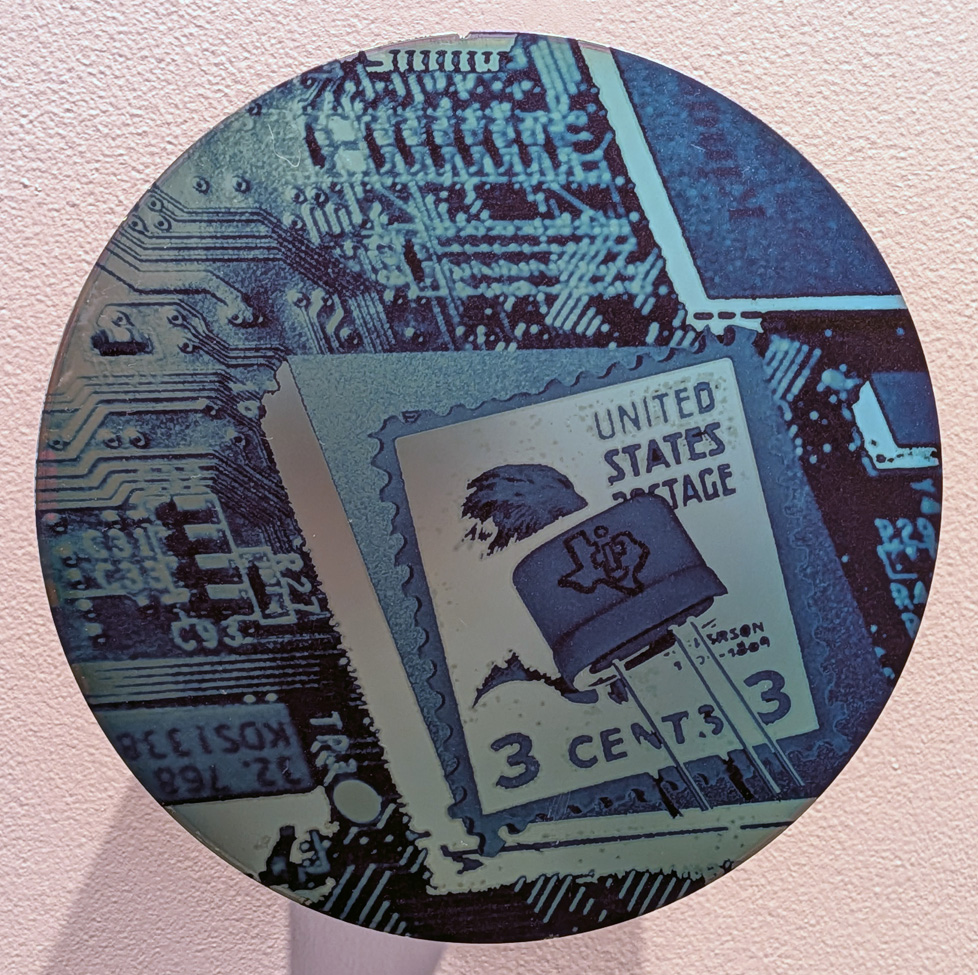 detail of disc with TI postage stamp