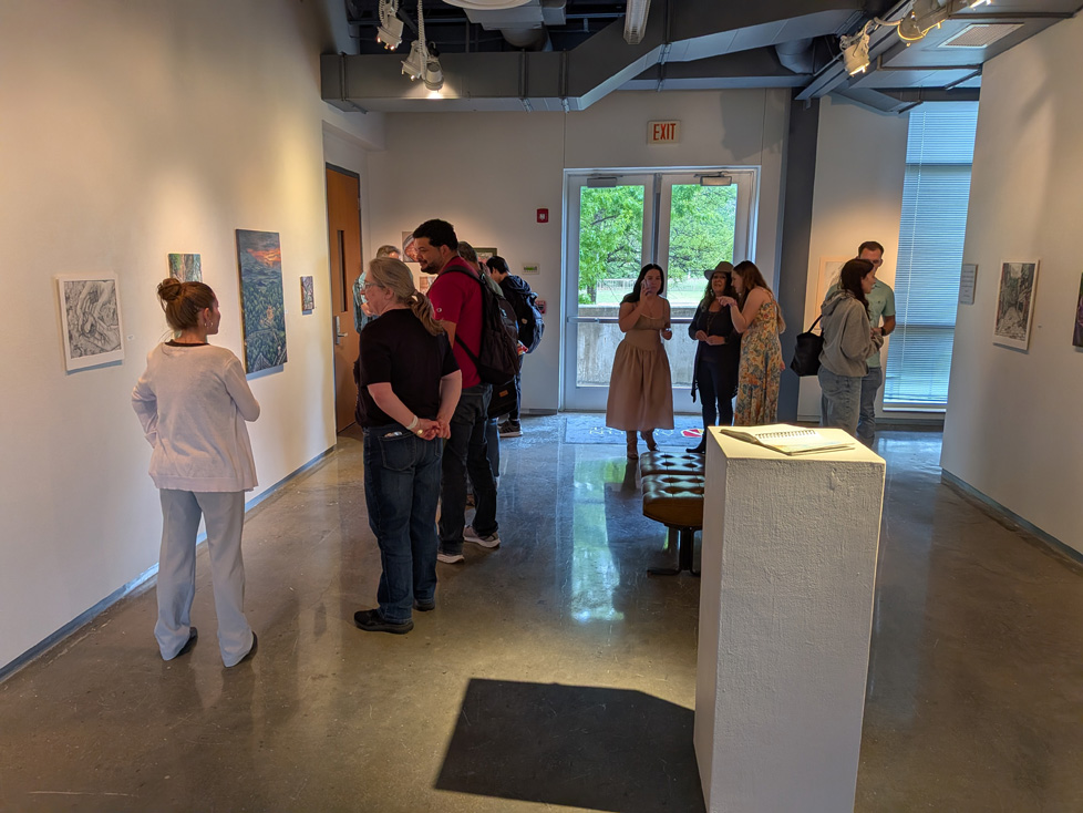 reception photo of people in gallery