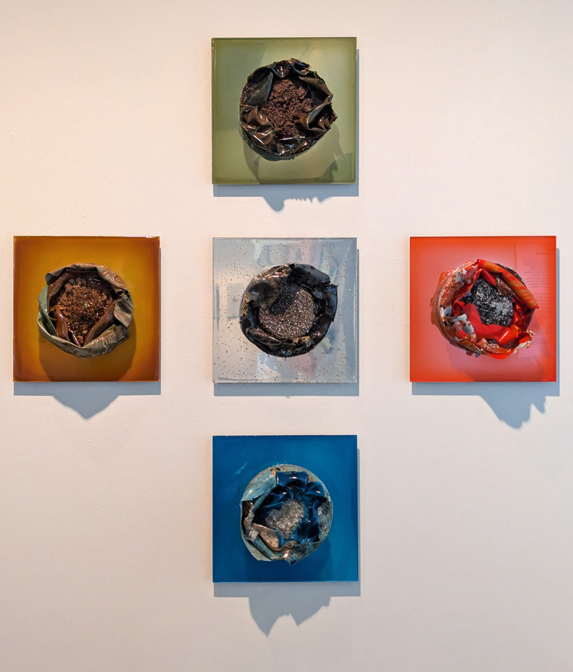 another cross formation of squares: green, brown, silver, red, and blue