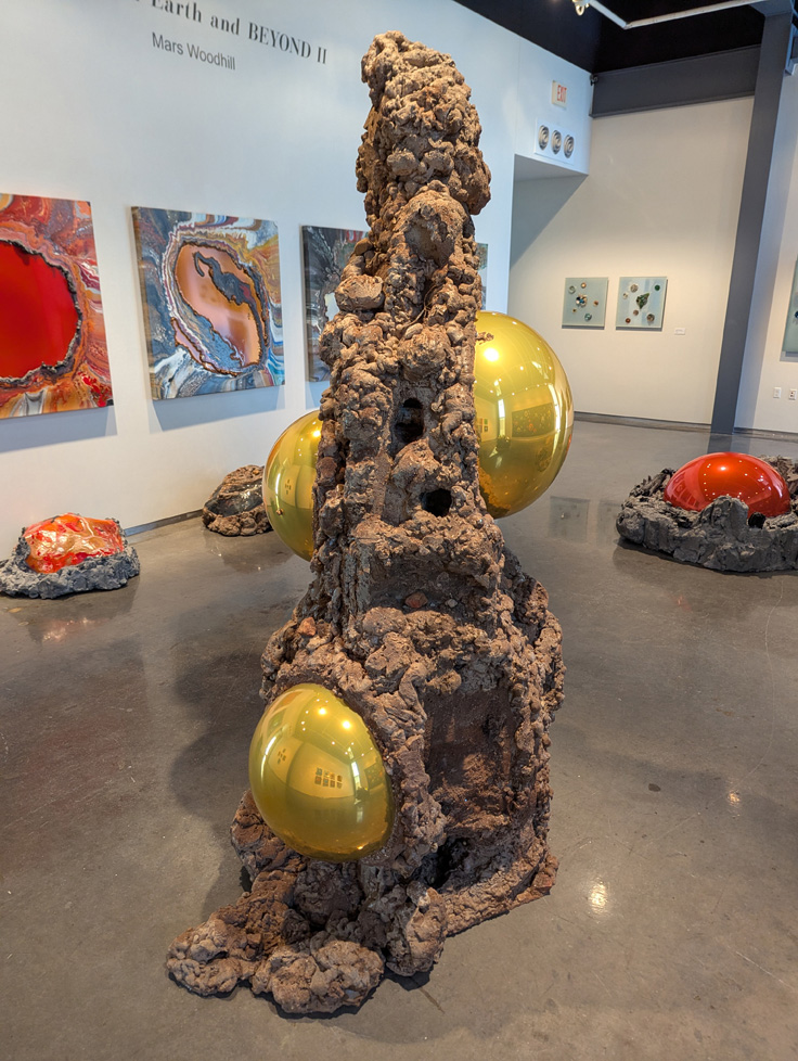 2nd view of yellow ball rock sculpture