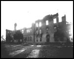 The burned remains of Old Main in 1913